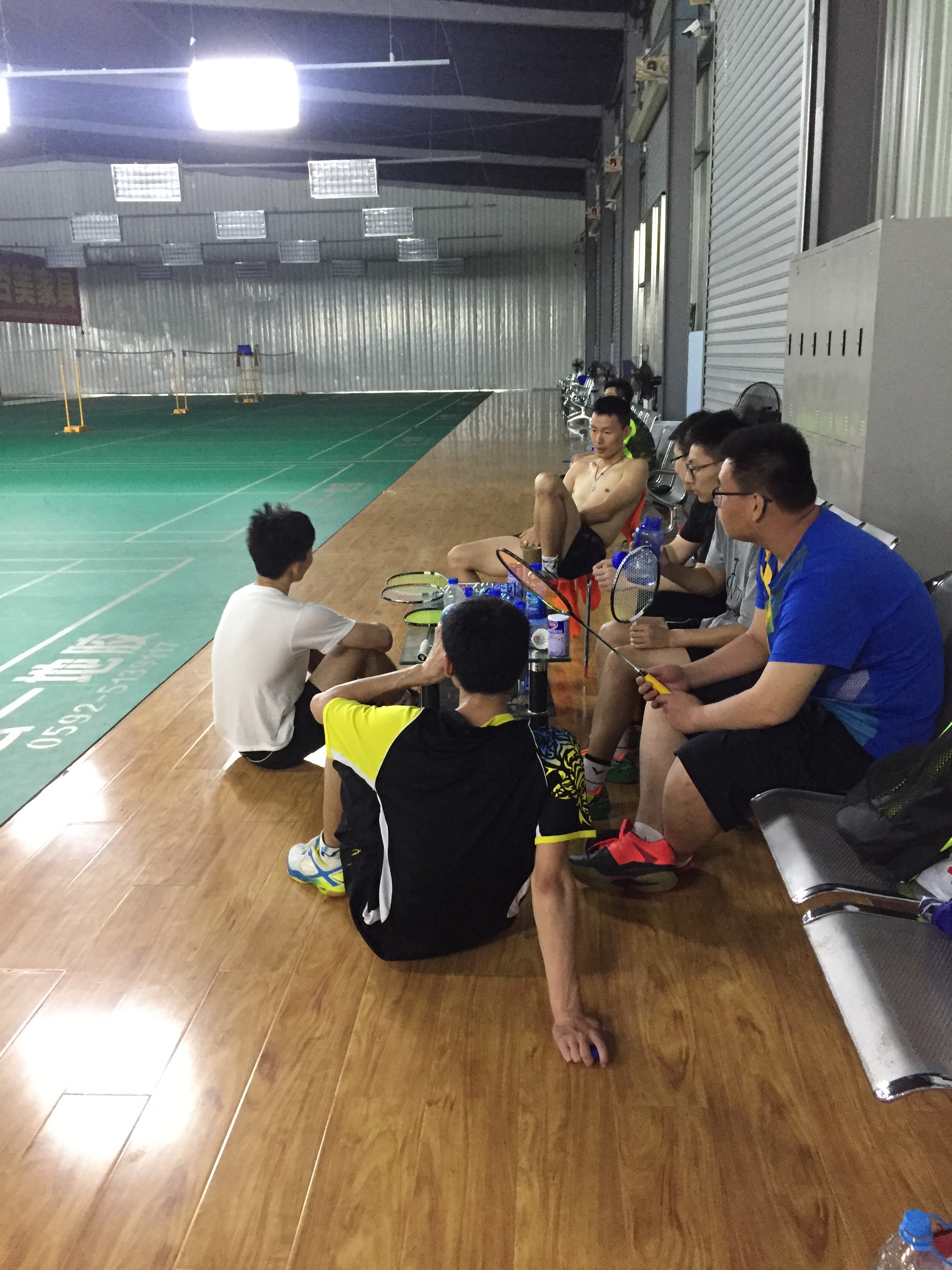 I caught a bunch of younger players sitting around my coach listening to him talk about badminton. I couldn't help but think it was like a master and his disciples. 
